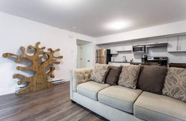 Robson Place Suite **