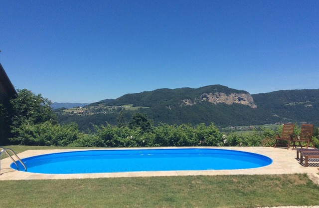 Chalet romántico con un gran jardín y una vista de ensueño del Draufelsen.