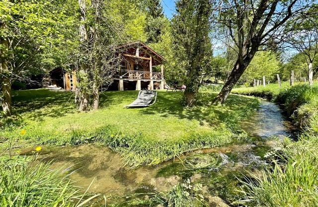 Romantic chalet with a hot tub and a steam room