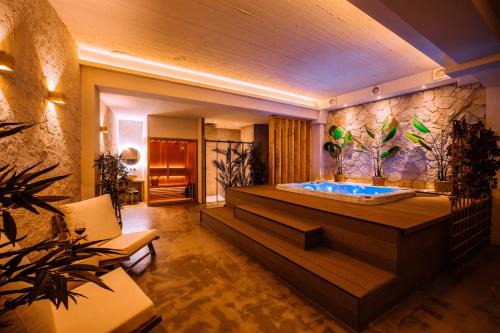Romantische suite met jacuzzi & sauna - dichtbij stadscentrum