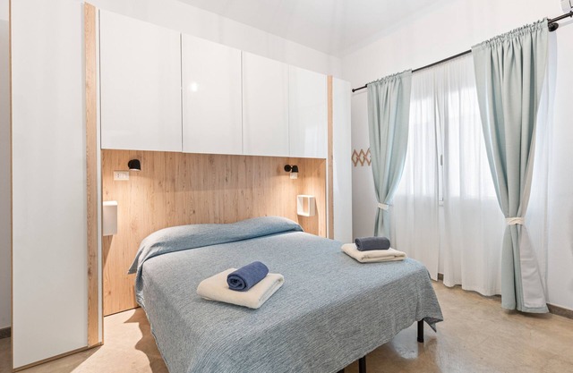 Habitación '40°Parallelo - Ampia Matrimoniale 4' con jardín compartido, Wi-Fi y aire acondicionado.
