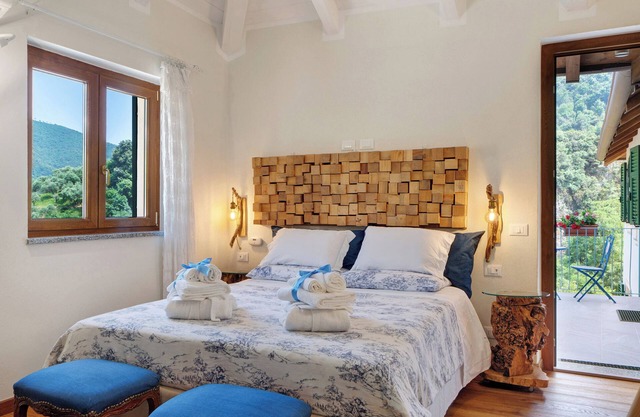 Habitación 'Aegua' con vistas a la montaña, Wi-Fi y aire acondicionado.