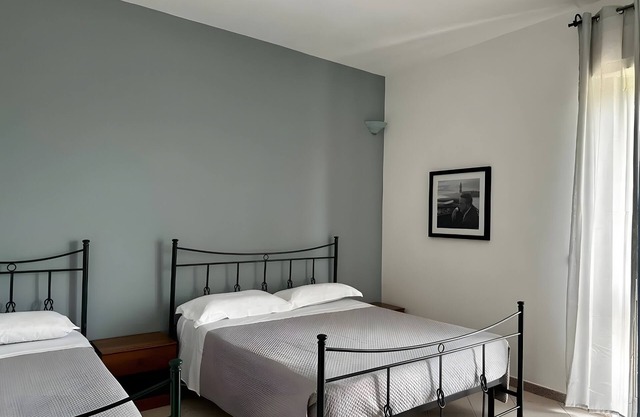 Habitación 'Camelia 1' con terraza compartida, Wi-Fi y aire acondicionado