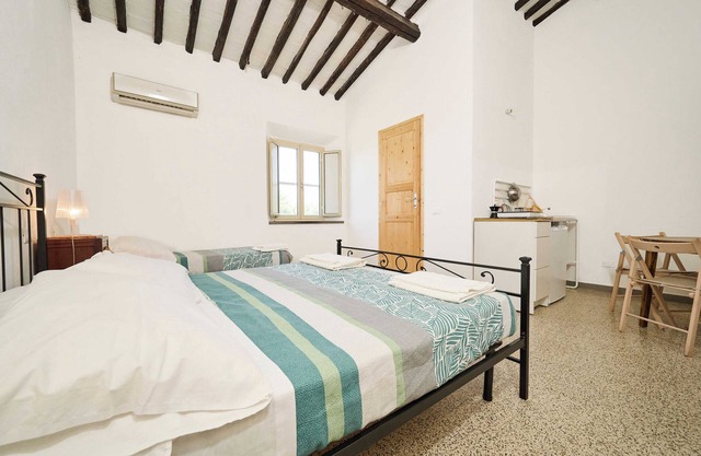Habitación 'Camera 2 - Del Ponti' con jardín compartido, Wi-Fi y aire acondicionado