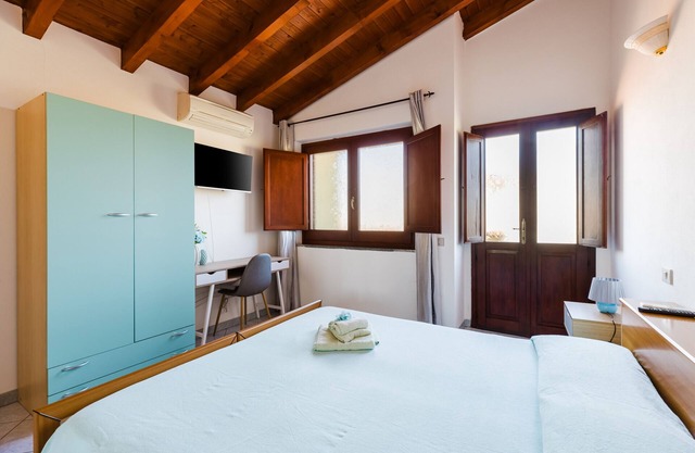 Habitación 'Camera 4' con terraza compartida, Wi-Fi y aire acondicionado
