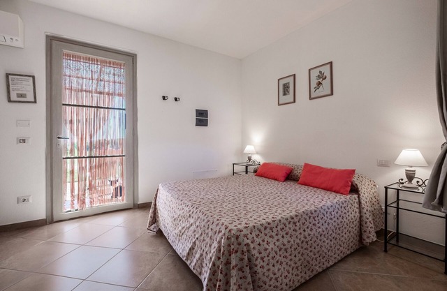 Habitación 'Giusti - 3 Leccio' con jardín compartido, Wi-Fi y aire acondicionado.
