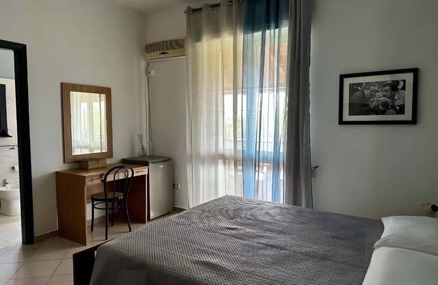 Habitación 'Iris 4' con terraza privada, Wi-Fi y aire acondicionado