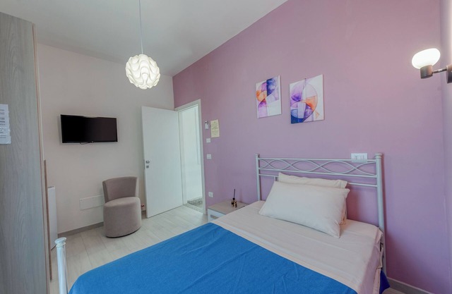 Habitación 'Lazzarella' con terraza compartida, Wi-Fi y aire acondicionado