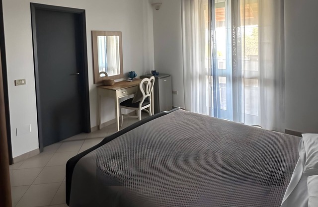 Habitación 'Margherita 5' con terraza privada, Wi-Fi y aire acondicionado