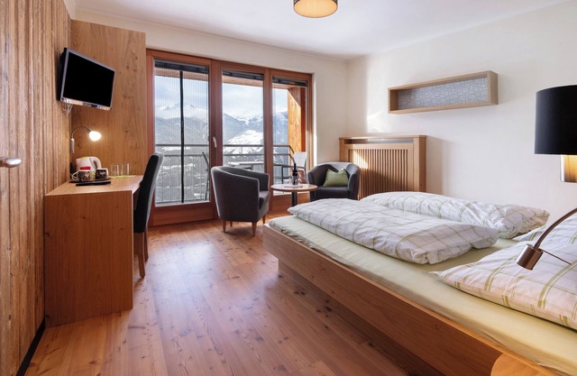 Habitación 'Ortlersuite Zi 4' con vistas a la montaña, jardín compartido y balcón