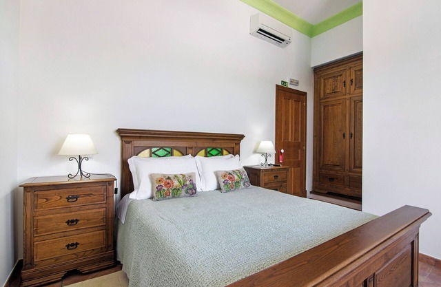 Habitación 'Quarto Verde -Vista Campo-com Pátio' con piscina compartida, Wi-Fi y aire acondicionado.