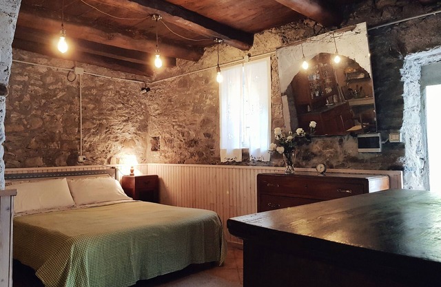 Habitación 'Taverna' con vistas a la montaña y jardín compartido