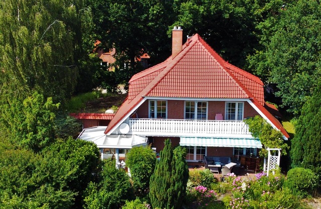 Room with balcony and garden