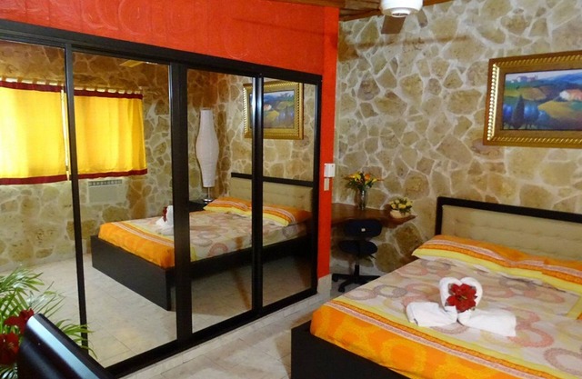 Room + yummy breakfast, steps from casino/beach, guest-friendly, pool/TV/WiFi