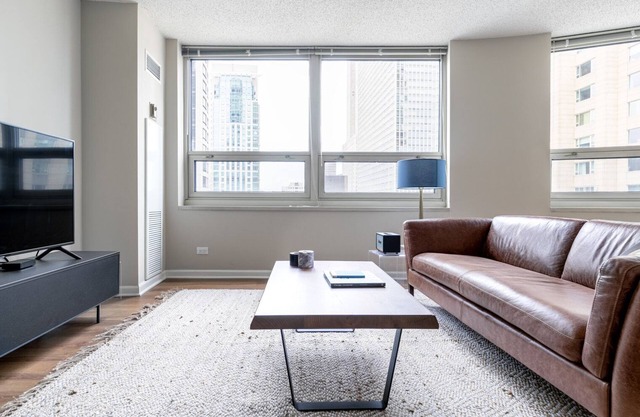Roomy River North 2BR w/ Gym, Deck & Pool, walk to Mag Mile, by Blueground