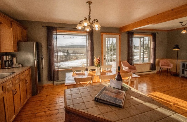 Rrustically decorated chalet on two floors with 4 bedrooms.