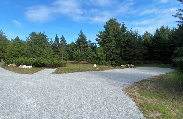 Rustic campground in De Tour Village with Large secluded lots. Site A