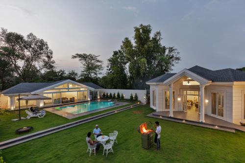 SaffronStays White Pearl