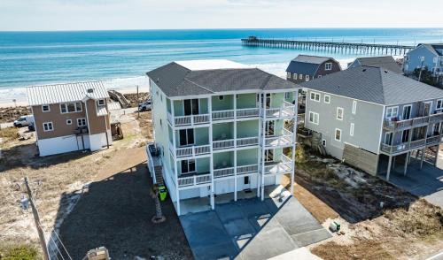 Sandpipers and Sunshine by Sea Scape Properties