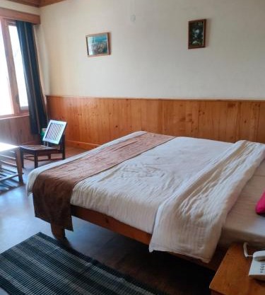 Santoshi Cafe & Rooms