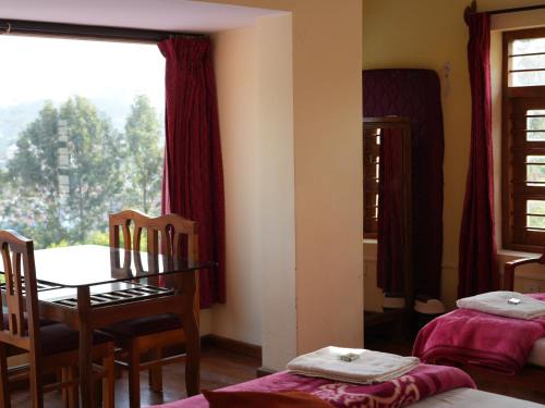 Satya Anand Cottage Pure Veg and Non Alcoholic Hotel
