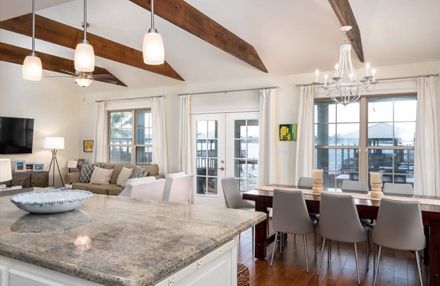 Screened porch and private pier on False River