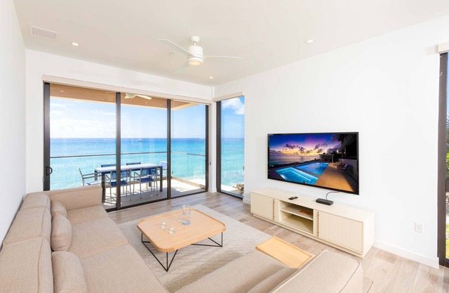 SeaDreams #4: New West Bay Beach Condos w/ Oceanfront Pool, Heated Spa + Rooftop Lounge
