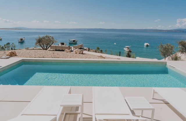 Seafront Luxury Villa Marim with Beach and Pool