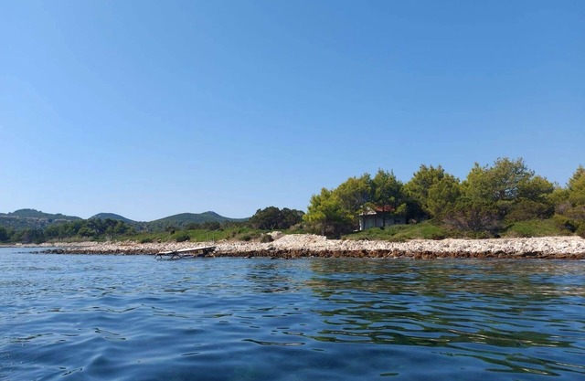 Casa de pescador para vacaciones junto al mar Krknata, Dugi otok (K-8150)