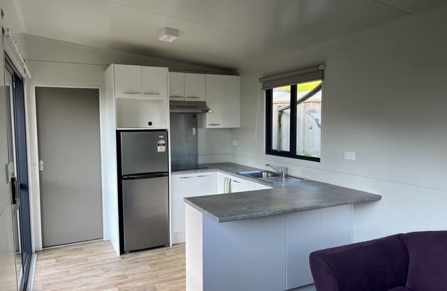 Secluded in the hills with mature trees and a peak view of the harbour