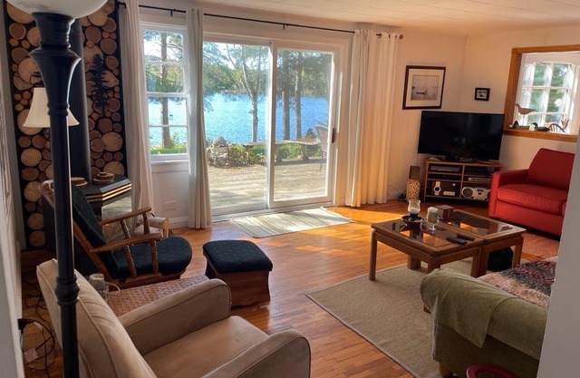 Secluded Lakefront Escape on 1.5 Acres of Pristine Waterfront