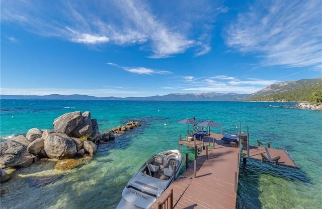 Secluded Lakefront Estate in Secret Harbor is a Luxurious Beachfront Compound
