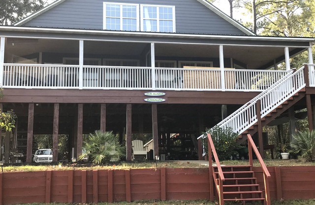 Secluded Waterfront with deep water dock, trailer parking, and public boat ramp