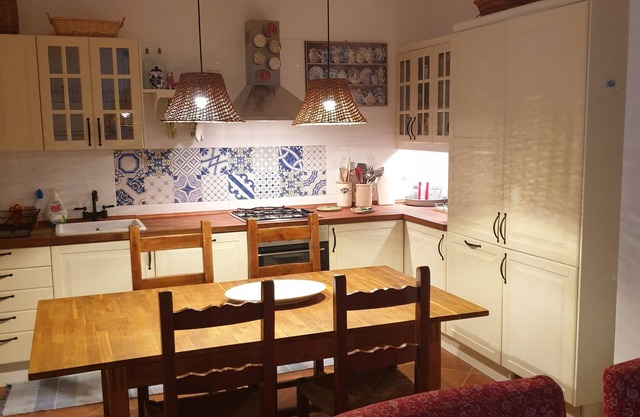 Self-contained house, nestled in a pine forest, just a few meters from a beautiful bay.