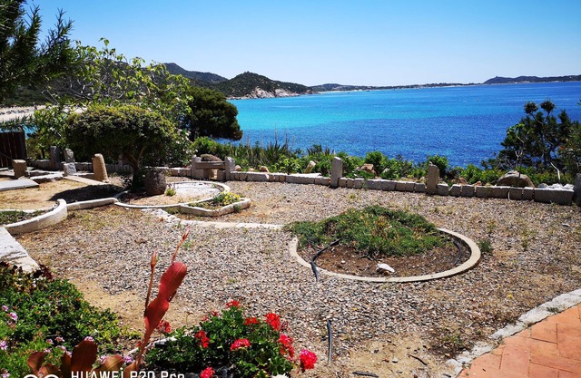 Casa adosada frente al mar (10 metros) con jardín privado IUN P5807