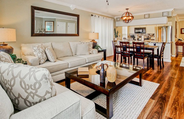Serene lakefront condo with pool full kitchen, pond and golf course view, & W/D