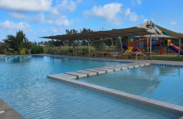Serene Vipingo Apartment with Pool & Garden Views, Minutes from the Beach