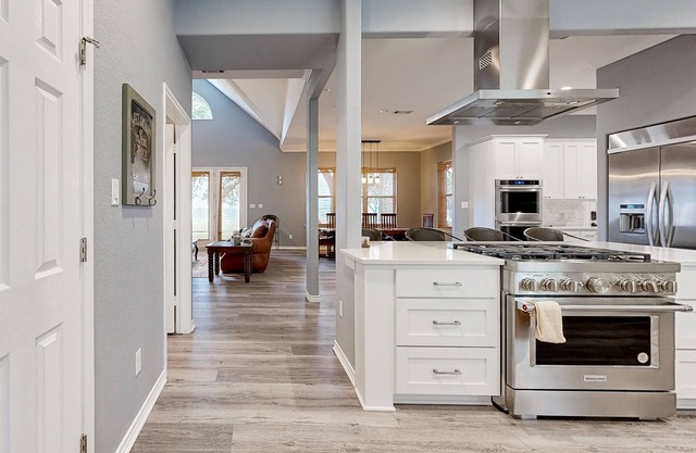 Serene waterfront house with pool table, game room and lake views