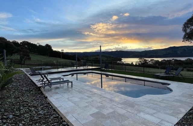 Set on the waters edge at Bonnie Doon. Stunning views and room for 25 guests