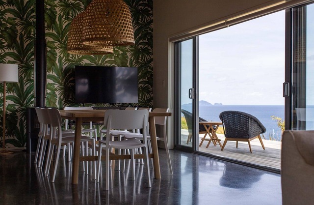 Simple but luxurious self-catering cottage with views of Poor Knights Islands