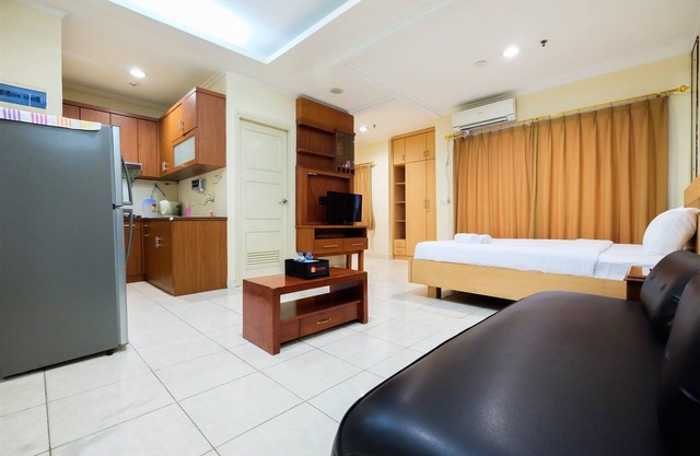 Simply Spacious Studio Room at City Home Apartment near Kelapa Gading