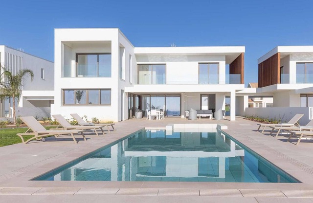 Sitting in an exclusive gated collection of holiday homes, this brand-new villa is only minutes from
