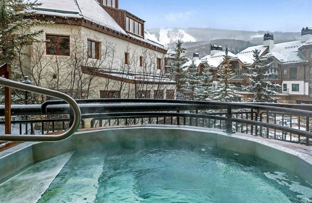 Ski, in Ski out 2 Bedroom Vacation Condo With Resort Amenities That Include Exercise Center, Indoor Pool, and Hot Tubs