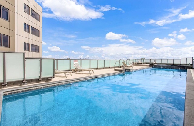 Skyline Studio with Parking, Pool, and Sea Views