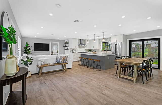 Sleek home near beaches, shops, & dining, with private pool & high-end kitchen