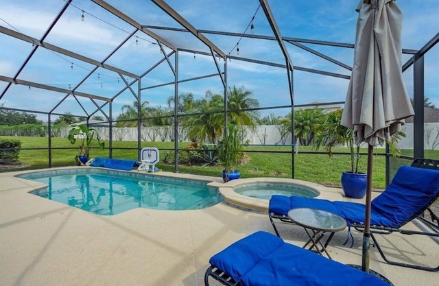 NUEVO EN EL MERCADO !! Hermosa casa de 4 BR 3 1/2 BA con piscina privada con sala de juegos cerca de Disney