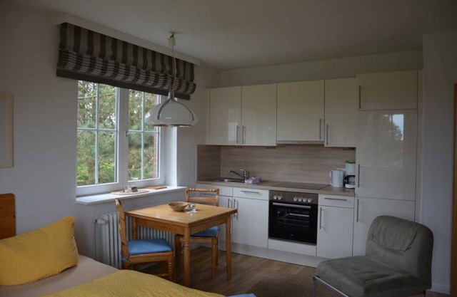 Small, bright vacation apartment with a view of the mill
