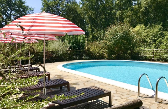 Small stone cottage in the woods, artists retreat, with pool