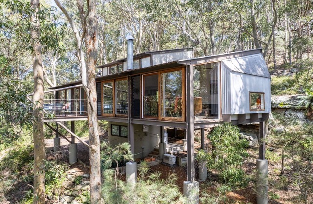 Snuggled in the Treetops with bay views