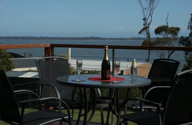 Somers alojamiento de vacaciones, con impresionantes vistas al mar balcón y jardín privado